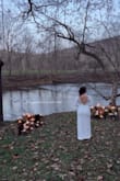 This was everything I wanted and more. It was simple yet classy and elegant. I had a private winter elopement and wasn't sure how much I wanted to spend on a dress and after looking at reviews and narrowing it down, I got a Large in this and it was perfect. The ONLY thing I would say is that you need to make sure whatever bra you have works under it. It is a thicker material, but not thick enough to hide your nips in the winter, lol. Have not gotten my photos back yet, this was a shot my photographer took on her phone during the portrait session we had afterward. Also, know that the slit is really high. I'm not used to wearing short dresses so to some I think it would feel normal, but I was afraid I was going to be on display if I wasn't careful with my walking and sitting. Otherwise, would do it all again in this beautiful dress. Thank you, Lulus! - Gabrielle K.