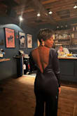 Purchased this jumpsuit for a holiday party. The back is giving!! The shoulders fit a little loose. Had to get alterations done to keep the sleeves from falling down. Perfect for a night on the town out. - Britteny D.