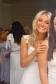 This dress was the perfect long white dress for my sorority event with my sisters! Beautiful details make it fun & different from other white dresses out there. - Ezra K.