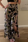 I wasn't able to fit my long torso into this, but worn just as pants, it is a fun breezy look. I need to pin the leg slits otherwise they can be way too revealing, but it's an easy fix. - Julie O.