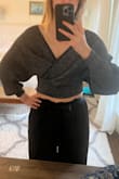 I loved the off-the-shoulder design, and how the fabric was sparkled without being scratchy. I only wish it was longer in the torso, but that could just be my weirdly long torso. - Julie O.