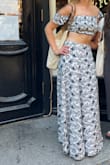 I LOVE this style of two-piece! The long skirt makes it feel glamorous and the slits and crop top keep things breezy and not overheated. The design is lovely for a summer brunch or island vacation. - Julie O.