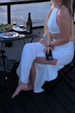 I love how breezy and sexy this set is! The back and leg slits show a bit of skin, but perfect for a hot day and the color and fabric keep things classy. - Julie O.