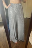 Adore!! These pants have all the glam AND pockets without any of the uncomfortable hassles of fancy clothing. Breezy and so comfortable. They were perfect length on me, hems just barely sweeping the floor, but anyone shorter will need heels or hemming. - Julie O.