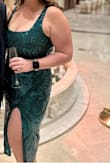 The overall quality wasn't that great. The sequins kept falling off the dress, and the cut in the chest was asymmetrical. I don't plan on wearing the dress again so it didn't bother me that much. For the cost, I would've expected more. - Laurel S.
