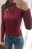 Cute top for winter, easy to layer, or wear by itself. The material is actually pretty thick. Can be casual or dressed up. - Sabrina P.