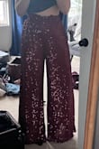 Immediately purchased these pants after they came back in stock after endlessly trying to find similar styles online, but could never find ones that were "wide-leg" style. It was seriously the best party purchase ever and I've worn them 5 times in 2 weeks for various holiday events/parties. I always receive so many compliments wherever I go. The waistband is stretchy to allow for all the holiday food, the legs are super flowy so you almost feel like you're wearing a dress, and best yet, it comes with pockets - always a plus. - Sarah M.