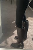These boots look super super chic and expensive. The leather and coloring look and feel high end, and the metal details, which can often look cheap, are subtle and high end looking. The shoe runs true to size. It is comfortable enough to walk around in the city. Overall a great price for a boot that is really sophisticated and perfect for many different occasions. - Jessica G.