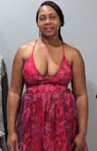 The dress is really beautiful. I currently wear a size large. The dress was a bit snug but overall loved it. - Dahlia H.