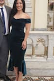 The dress was a perfect fit. Form-fitting, flirty, and perfect for my curves. - Melanie D.