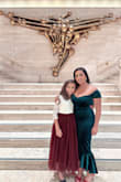 I wore this dress to a performance. It's stunning, and the color is rich. The material is very forgiving, and the fit was flattering. - Camille J.