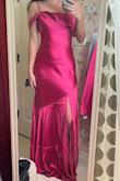 I'm going to be a bridesmaid for a summer wedding and needed a hot pink, satin, floor length dress! I knew that the dress would be floor length on my frame. I ordered XS and S during black Friday to see which fit better. Both felt really good on but XS ended up fitting closer to my body, not tight at all. I returned the S with no issues. The color is exactly what the bride wants so it's perfect! I steamed it after taking this pic to get the wrinkles/creases out. Looks and feels very lux after the steam! FYI standing straight with 3-4 inch heels, the XS is perfectly grazing the floor on my 5'3" frame, so I'm not even going to hem it! - Ashley S.