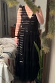 The shape was flattering, but for a wedding guest it was not the right vibe, really screamed Addams family with the sleeves and not the elegance the pictures made it seem like. I'm 6" and the dress sat above my ankles so too short for me. Also not sure if it was because of my height but where one ruffle landed below my hips so it made me look wide. - Dorothy-Faye S.