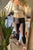 I'm normally a L/XL and I could have gotten away with a medium. I'm not sure going down a size would have fully solved my problem though, there was so much excess fabric the top seemed like it was made for a more busty gal. A smidge see through but cute neckline, not too revealing - Dorothy-Faye S.