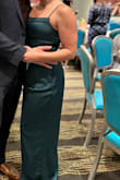 Beautiful color. I bought this for a Christmas party. Fit great. I just needed to get it hemmed. - Briana B.