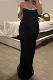 This dress fits perfectly and has a stretchy strap in the back making it fit more than one bust size! I'm a 34B and the dress fits great as long as I use a good bra with it. A friend of mine is a 36DD and she was able to fit the dress as well! It does run a bit long but I was able to make it work with heels. - Gresia L.