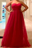 I bought the gown during the Black Friday sale and it is an incredible find for the price I paid. The gown is plenty long even when worn with heels. The skirt is voluminous and looks expensive. The tulle is a good quality and does not look cheap. I bought the size L and the bust fits a smidge loose on me but it stays up okay. - Chayanika M.
