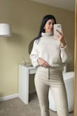 The perfect neutral oversized sweater. It fits perfectly. I'm usually a size S and it fits true to size. - Deena K.