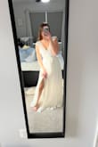 I got this dress for my rehearsal dinner as the bride. It is so gorgeous and the detailing at the top is of good quality and does not look cheap. The top is a little tight on my bust and armpits but I would not change the size due to the overall fit. It fits better with no bra and is not see-through. - Kasey D.