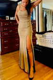 Purchased this dress for a black tie occasion and wanted something other than black. The dress is very nice, fabric is good with little to no stretch. If you're in-between sizes go for the bigger one. I think this dress looks best with a little room. - Sandra V.