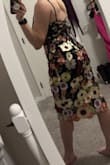 The dress fit perfectly and it looks just as good as in the photos. The flower details are absolutely stunning. I can't wait to style it for the actual event. - Bridget G.