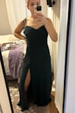 This dress is perfectly nice, but I won't say I am excited to wear it. It runs large, and the cut isn't especially flattering. Not bad, just not great. The green is also super dark, so it's hard to tell the color - Sophia M.