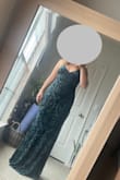 With an athletic build this dress hugged in all the right places and forgave in all the right places. Straps a little loose for small bust but easy to pin up. Highly recommend - Molly M.