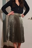 This is a truly beautiful skirt! I was debating between medium and small and got small based on other reviews, and it fits like a glove! Medium would be too big. The fabric is not cheap. It sits a bit weird around the zipper, but I am still in love with it! - Volha B.