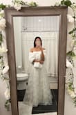 Bought this for my winter wedding court ceremony to keep me warm, and I'm very happy with it! I read in the reviews that it comes with a clasp, which is a bonus so I don't need to keep holding it. At first, I didn't see the clasp, but it's just hidden well among the faux fur. It's a true white color and sooo soft. Because of my small frame, it can come down the shoulders a bit and, if I had my arms straight down, would likely fall down my elbows. But didn't really have issues with it at all. I'm very happy with how it turned out with my dress :) - Kyla M.
