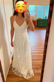 I ordered this as a potential elopement dress, and although I didn't end up keeping it, I absolutely loved it. As soon as I put it on I felt like a princess. I was obsessed with the level of detail (love the subtle shimmer from the sequins, the delicate flowers, and the hint of silver/gray). The website pics don't really do them justice. Note that the straps are fully adjustable - it's just one long strap on each side, so it requires a lot of pulling and tugging to get them just right. This is a huge benefit in terms of fit, but as someone who will be getting ready by herself, it wouldn't be ideal. It's super lightweight, so would be amazing for a warm climate. The medium fit me perfectly (see measurements). Ultimately, I just don't see myself getting married in it, but I would love to wear it to another event one day! - Natalie J.