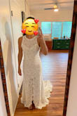 Things I love about this dress: the open back, it's very comfortable and lightweight (would be great for a beach wedding or hot climate), and the train is stunning. Things I did not love about this dress: it runs big for a medium, especially around the arms (kinda gapes at the sides, which I tried to capture in one of the photos), front slit (why is it in the middle?). Overall, I thought it was pretty and comfy but nothing to write home about. This dress also helped me realize that although I love the look of lace on others, I don't love it on me. - Natalie J.