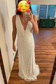 I was very skeptical about the beading, but I ended up loving this dress! The combo of deep V and low back is very flattering, and although it's a beaded dress, it wasn't too heavy. I was also surprised by how much stretch the fabric has (for some reason beading = very rigid in my mind). It's lower cut in real life than in the photo (a good thing in my book) but was ever so slightly too big in the bust. Not enough that I'd necessarily need to get it altered, but enough that someone with my waist/hip measurements but a bigger bust would have enough room. Ultimately decided on another dress, but honestly, this one was a top contender. - Natalie J.