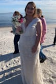 I bought this dress for a very small last-minute wedding. It was so pretty and arrived very quickly. For the price, I could not believe the quality. It was so perfect. The dress is a cream color. I have wider hips so I did order a size up. - Cayce D.