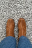 These boots are so cute! The heel isn't too high to make them uncomfortable. The soles are squishy so they're pretty comfortable to wear and walk in. I could have ordered a half-size down. For reference, my foot is 9.25 inches. - Rachel H.
