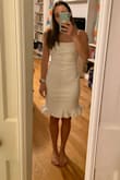 I ordered a small, which is consistently my size in Lulus, and was what the site recommended. It was very baggy on my chest and was longer than I expected but also rode up when I moved. Would probably work great with a different body type but it just wasn't a great fit for me. - Michele S.