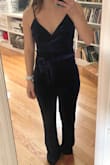 I think this would look great on some people, it just wasn't flattering on me. I had to size down to an XS so the top wouldn't be too loose, but that meant the jumpsuit lost its flowy fit and was more fitted through my hips which didn't look great. It seems to look much better on people with a larger chest. - Michele S.