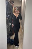 Ordered this dress for a black tie wedding, the fit is great, the material is stretchy to adjust to different people, the arm sleeves were plenty long and the dress is a good length to wear in heels. Sleeves also feel secure, doesn't feel like they'll slip off the shoulders because of the connecting line in the back. - Nicole W.