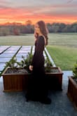 I bought this dress to wear at a formal wedding and got so many compliments. My favorite parts of the dress were the deep cutout in the back and the train. The top was a little snug around the bust but this size fit well otherwise. My only wish would be that the sleeves would have been a little longer because I have long arms but overall it was a great fit and I would definitely recommend it! - Jessica D.