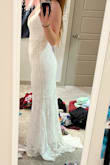 I don't love the all-over lace and felt a little like a tablecloth to me. The straps were also a little strange? Could be a pretty silhouette though - fits nice in the front. - Emily B.