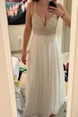 Love the side mesh, and very pretty in the front. Didn't love the open back, and it was too revealing for the conservative family members at my wedding, but it was really pretty. - Emily B.