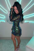 Loved this dress! Did a disco/70s themed party and it looked amazing with platform heels. It fit perfectly short though if you have longer legs/ are taller. Definitely didn't feel tight at all! Recommend!! - Suzhaunna L.