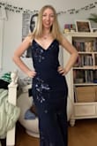 I got this dress for prom and it's gonna be perfect for it! It fits well, I like the color, and the material is nice and breathable. It is a little long so I just need to get it tailored, but other than that, love it! - Rebecca E.