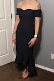 The dress is beautiful! It compliments your curves and keeps everything tucked in nicely. I'm usually a size small but luckily I ordered and xs and it fit perfectly! I'm happy with the quality and durability of the dress, especially for the price! - Kate F.