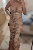 This is a well-made dress with a great fit and sparkle. - Lauryn B.