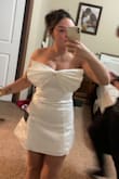 She is stunning! I usually would have ordered an XS but the reviews said it ran small so I ordered a small. I'm glad I sized up because it was still a little hard to zip around my chest. Other than that I'm obsessed! It's super elegant and perfect for my bridal shower. - Kate M.