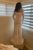 This dress is gorgeous and true to size. The only thing I would change is the lace on top front, and the lining to be attached at the bottom. Don't be afraid to buy this one. - Jenn R.