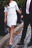 Love this dress. I was looking for a low-priced dress to wear as my wedding dress. This was simple but sophisticated. It got good reviews so I decided to try it. I loved it! It was comfortable and had some stretch. The material was thickish so you could not see bra color. It does show underwear lines, so needed to wear a thong. Overall this dress was awesome. I got tons of compliments and the price was right! - Rachel B.