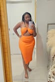 I wore this at the end of summer just when it's starting to get a lil chilly and it was perfect. Everything was held in place & has a lot of stretch so don't size up. - Meikisha D.