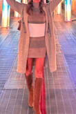 This dress is so warm & cozy. I would say was a bit loose but I wouldn't size down. I got my normal size. - Kimberley S.
