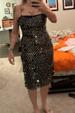 The dress fit great! I ordered a size up from what I usually buy, and it was perfect! Wore it to a New Year's Eve Party and got tons of compliments! It's the perfect length and is just a really fun dress! - Sarah B.
